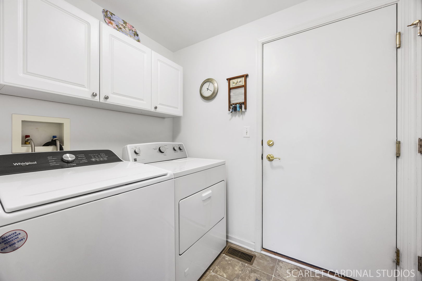 869 Cambridge Drive Batavia, IL 60510 - Photo 10 of 19 a utility room with dryer and washer