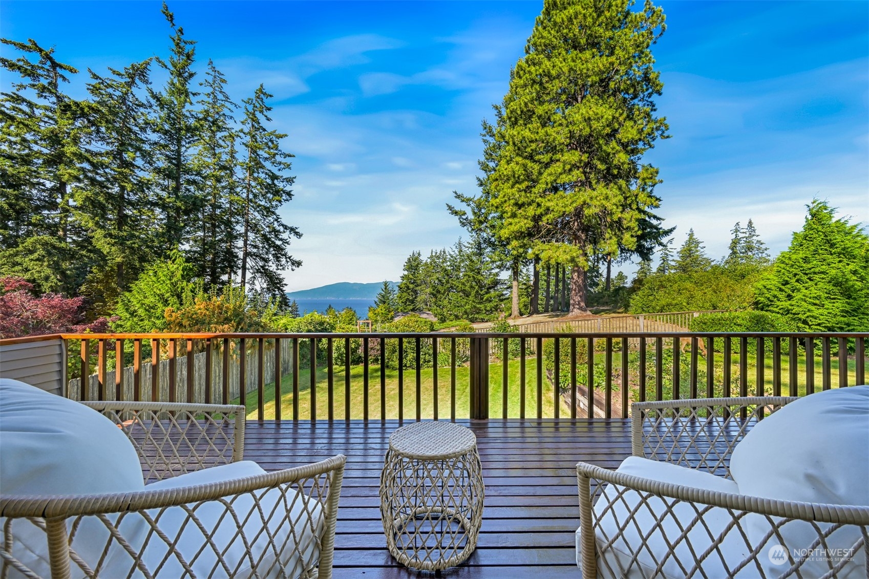 410 Fieldston Road Bellingham, WA 98225 - Photo 7 of 9 a view of a balcony with two chairs and a table