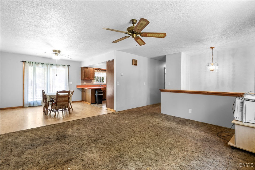 7530 East Lake Road Vienna, NY 13308 - Photo 5 of 35 Open living room, dining room and kitchen