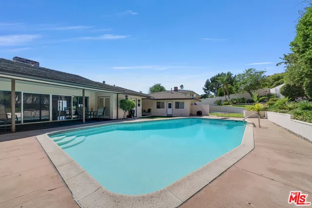 a view of a house with a swimming pool