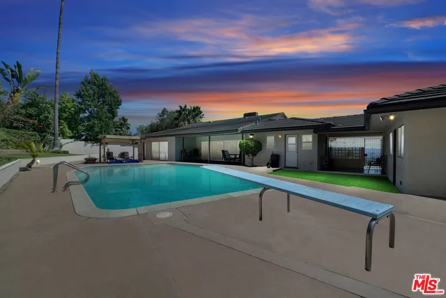 a view of house with outdoor space and yard