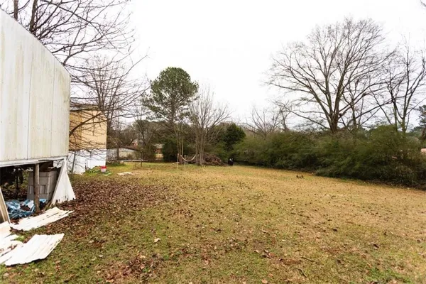 a backyard of a house with lots of green space