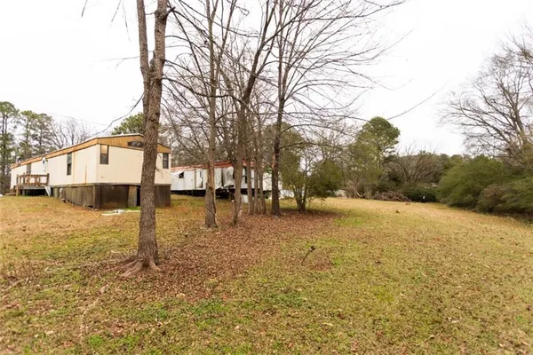 a view of a street with trees