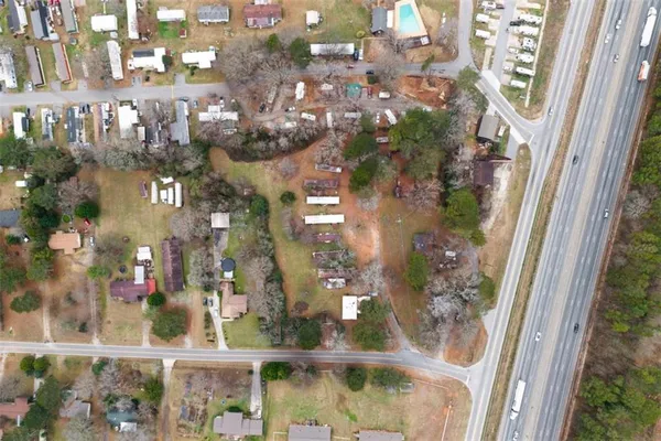 a view of balcony with wooden floor