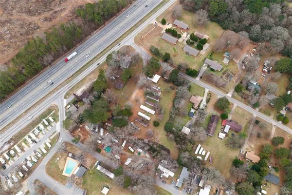 a view of a pathway with a yard