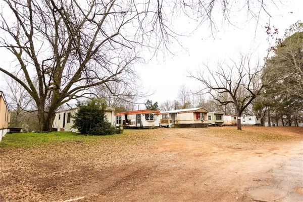 a house with trees in front of it