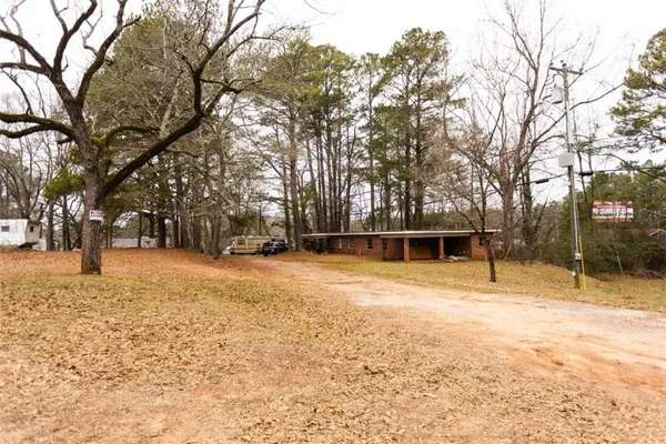 a view of a house with a snow on the roof