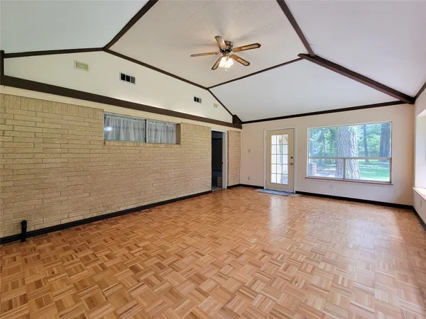 a view of an empty room with a window