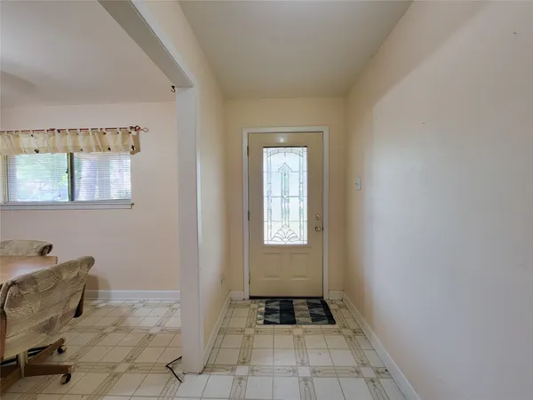 a view of a room with windows