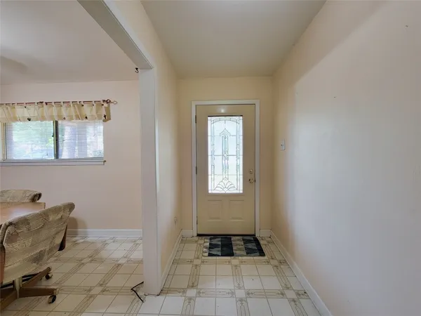 a kitchen with stainless steel appliances granite countertop a stove and a refrigerator