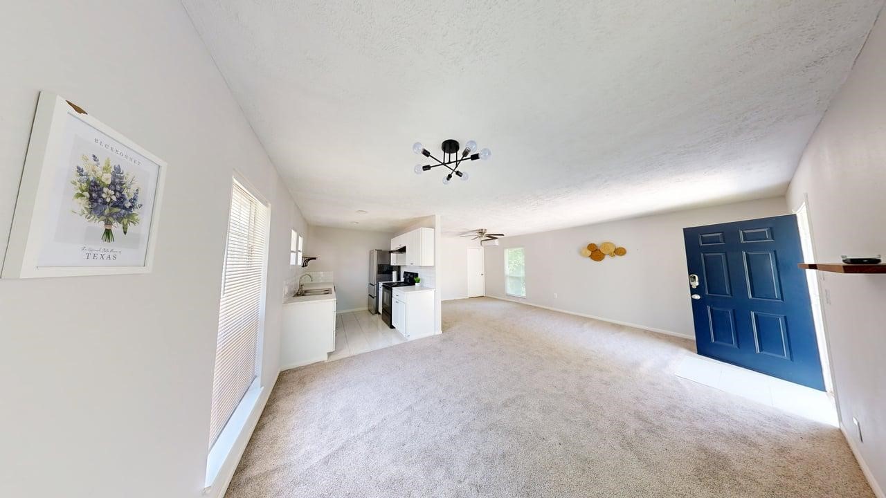 619 Cotter Drive Spring, TX 77373 - Photo 45 of 50 a view of a livingroom with a hall and a window