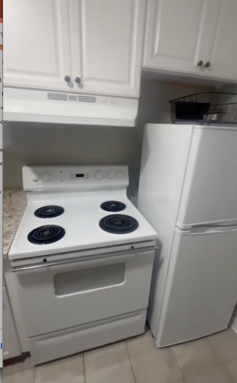 452 Main Street, Unit 4 Melrose, MA 02176 - Photo 2 of 8 a close up view of washer and dryer