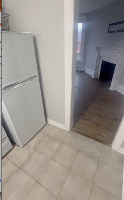 452 Main Street, Unit 4 Melrose, MA 02176 - Photo 3 of 8 a view of a hallway with staircase