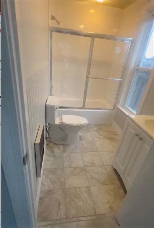 452 Main Street, Unit 4 Melrose, MA 02176 - Photo 5 of 8 a bathroom with a sink and a toilet