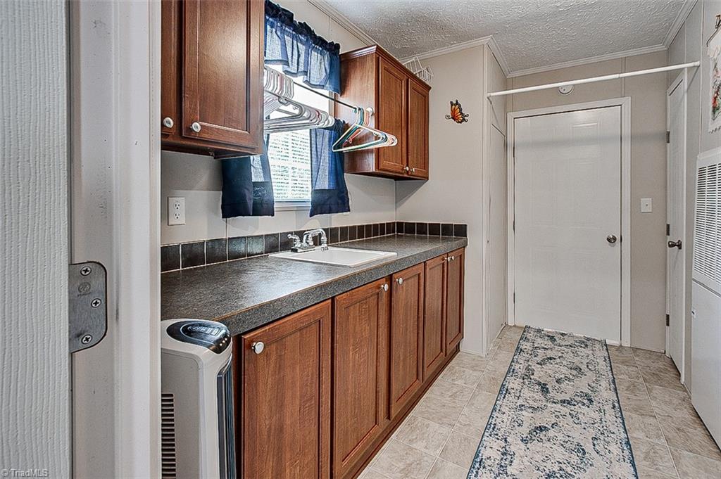 480-j C J C Teague Road Staley, NC 27355 - Photo 20 of 32 Laundry Room