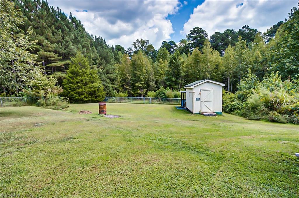 480-j C J C Teague Road Staley, NC 27355 - Photo 30 of 32 Fenced in Back Yard