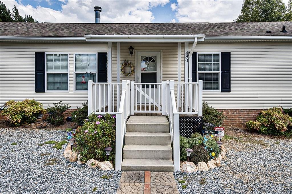 480-j C J C Teague Road Staley, NC 27355 - Photo 3 of 32 Front Exterior