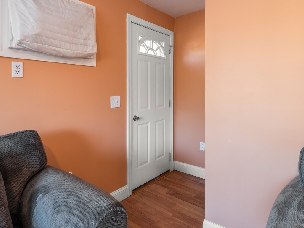75 Lawrence Street Northborough, MA 01532 - Photo 12 of 38 a view of a livingroom with wooden floor and closet