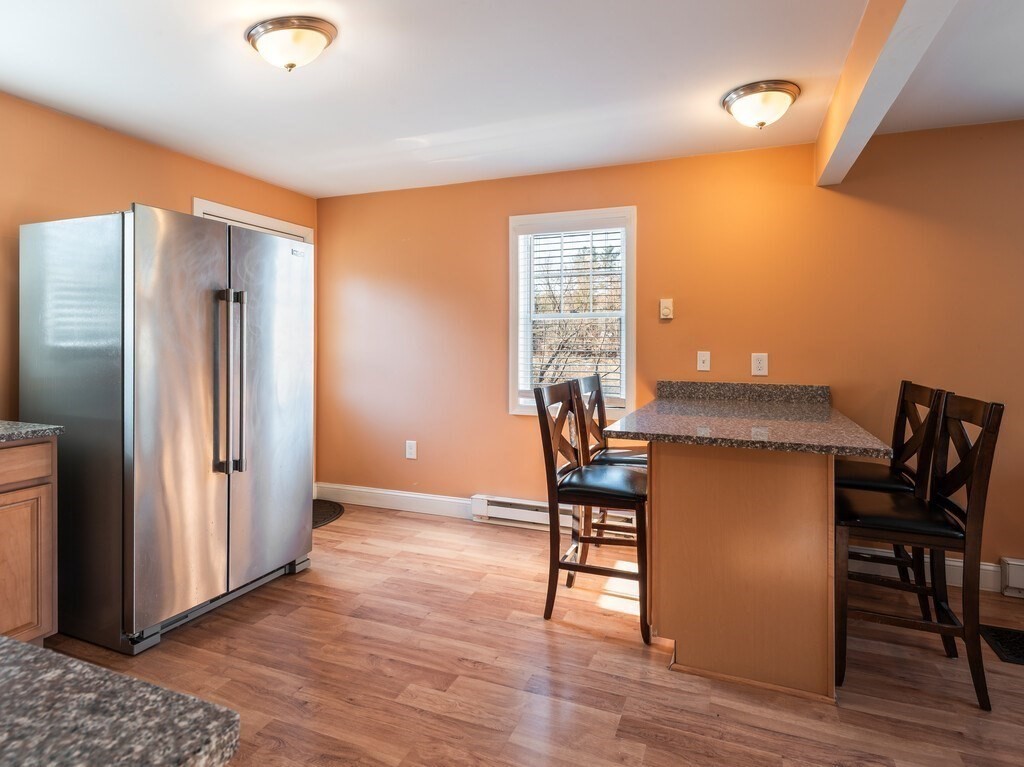 75 Lawrence Street Northborough, MA 01532 - Photo 17 of 38 a workspace with furniture and window