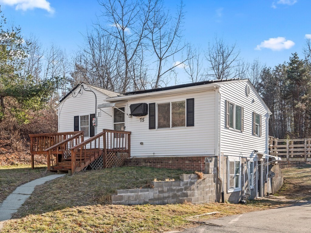 75 Lawrence Street Northborough, MA 01532 - Photo 2 of 38 a view of a house with a yard