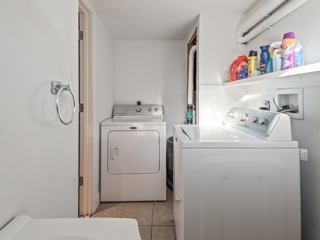 75 Lawrence Street Northborough, MA 01532 - Photo 36 of 38 a utility room with dryer and washer