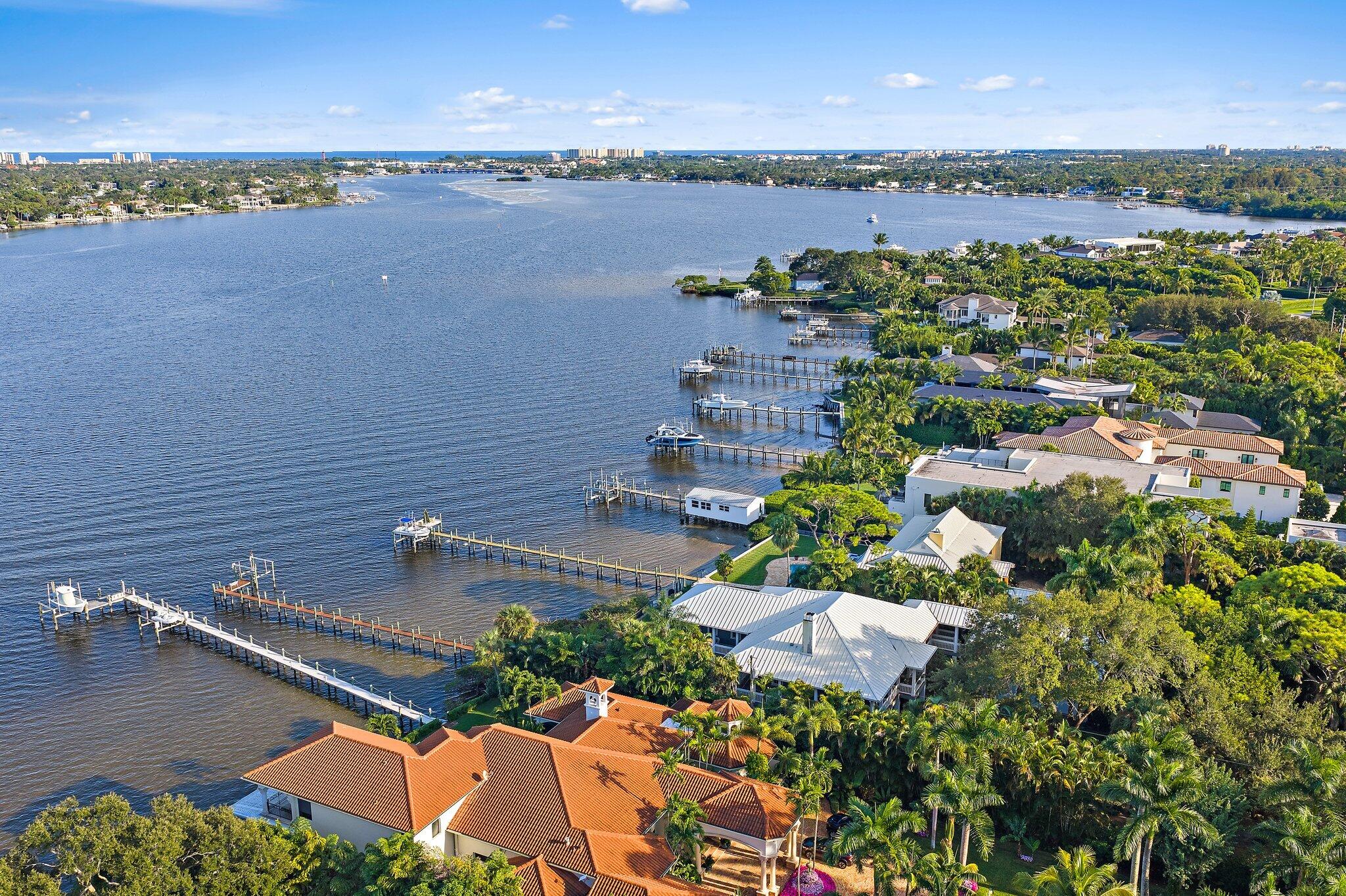 an aerial view of a city and lake view