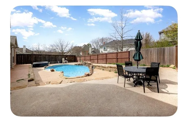 a view of a terrace with sitting area