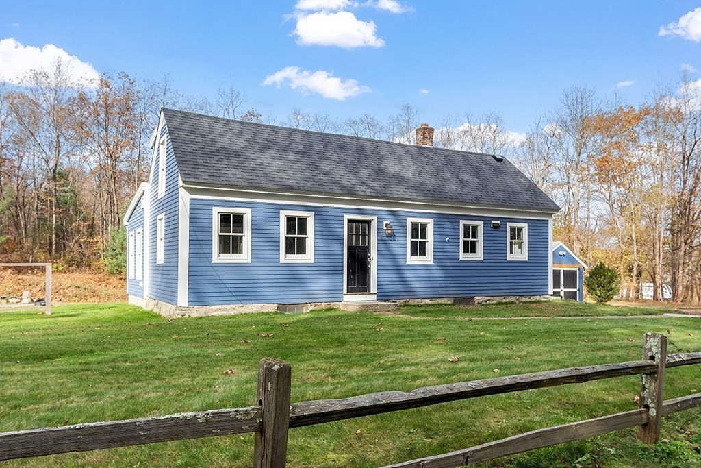 91 Gilchrest Street Lunenburg, MA 01462 - Photo 1 of 38 a view of a house with a yard