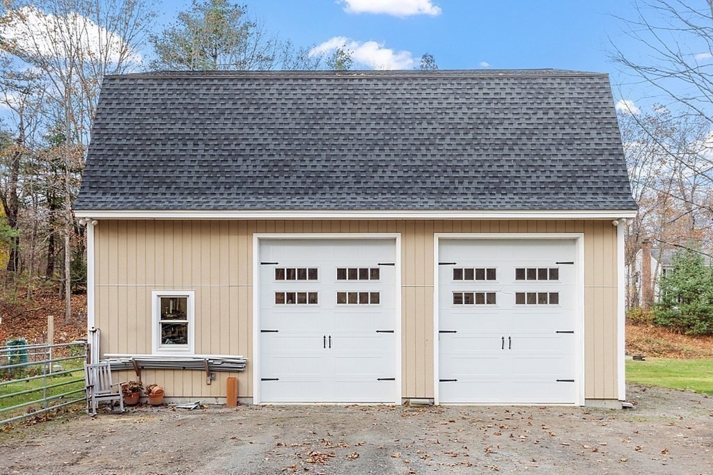 91 Gilchrest Street Lunenburg, MA 01462 - Photo 17 of 38 front view of a house with a door