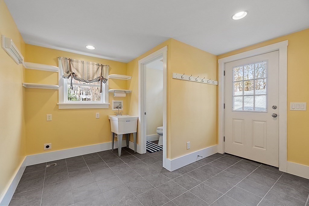 91 Gilchrest Street Lunenburg, MA 01462 - Photo 22 of 38 a view of an empty room with a window