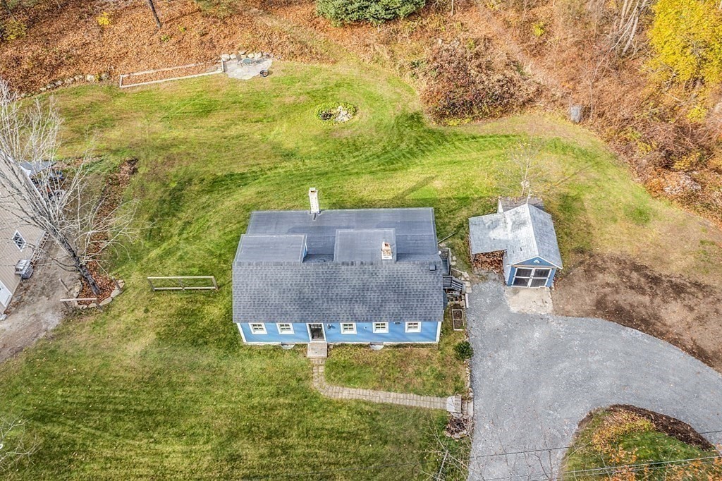 91 Gilchrest Street Lunenburg, MA 01462 - Photo 9 of 38 an aerial view of a house with a yard
