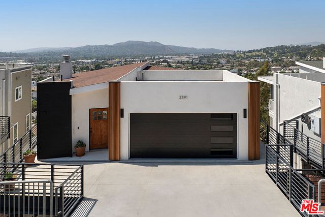 a view of a house with a balcony