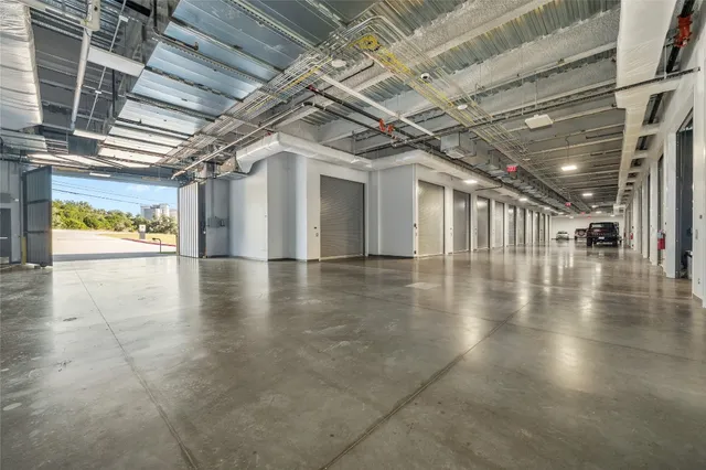 a view of an an empty room with a window