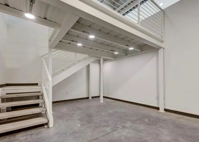 a view of a room with stairs