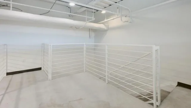 a view of a room with racks on the wall