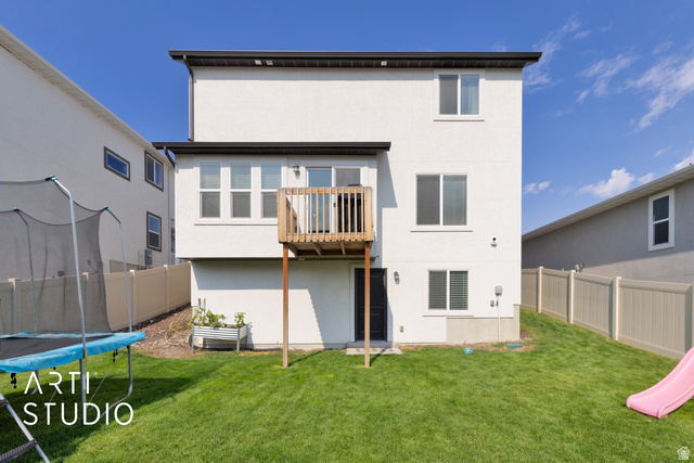 1713 South Windemere Road Santaquin, UT 84655 - Photo 27 of 40 Contemporary white exterior featuring multiple windows and a wooden deck
