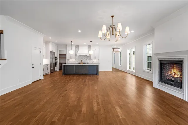 a view of a kitchen with a sink and a stove top oven