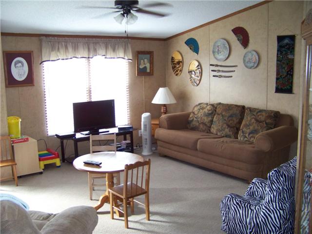2012 Mosley Ferry Road Chapmansboro, TN 37035 - Photo 5 of 20 A LARGE LIVING ROOM (17X13) IS PERFECT FOR ENTERTAINING OR JUST RELAXING WITH THE FAMILY.