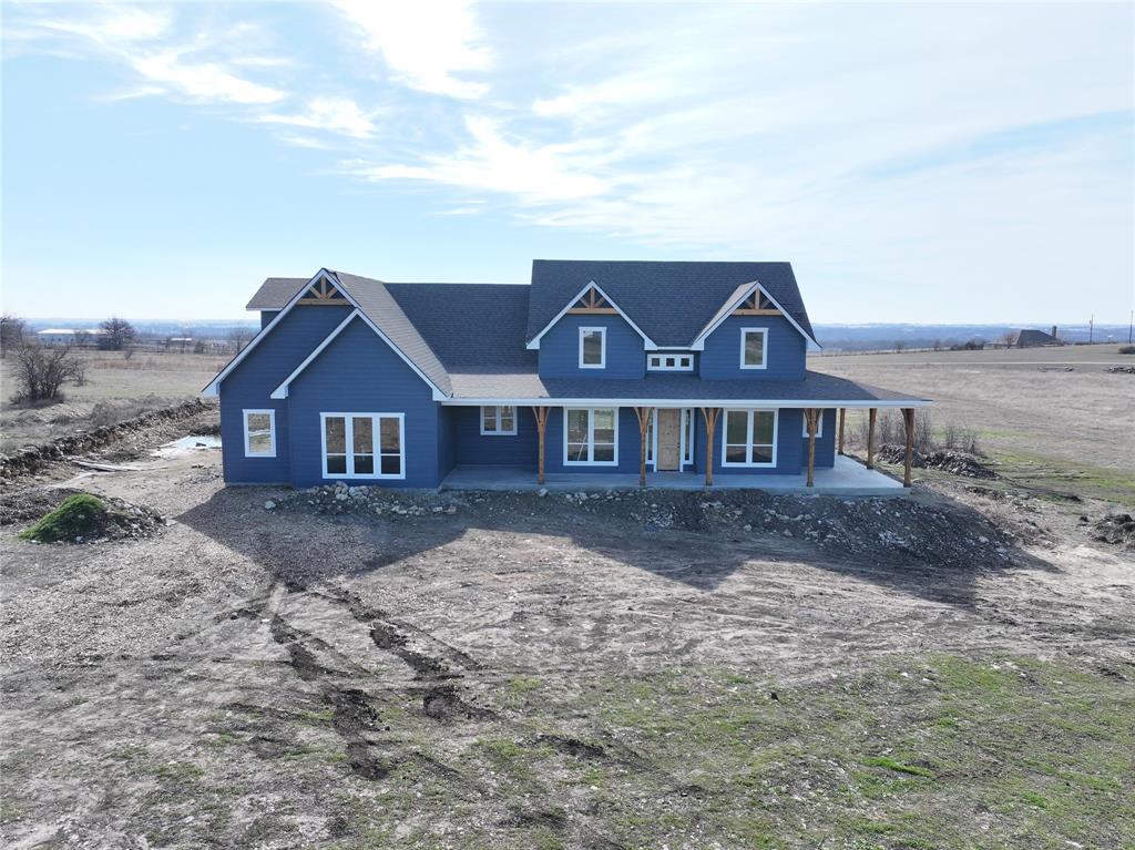 139 Chance Farm Road Decatur, TX 76234 - Photo 2 of 4 a front view of a house with yard