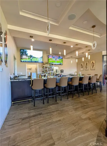 a group of people sitting at tables in a room