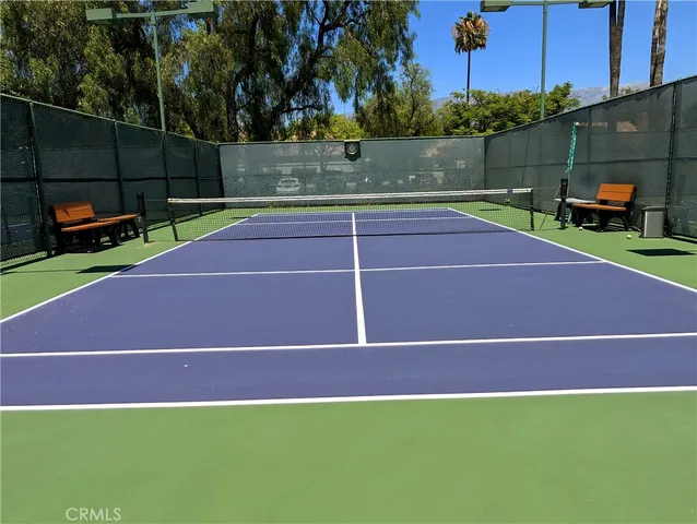 a view of outdoor space and tennis court