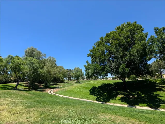a view of a golf course with a park