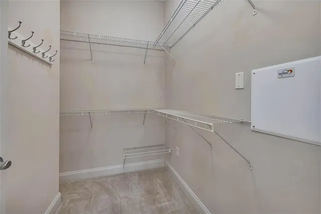 a view of an empty walk in closet