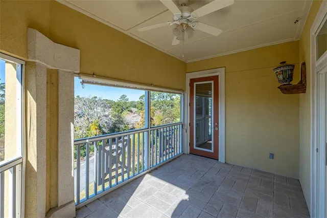 a view of a hallway to a window