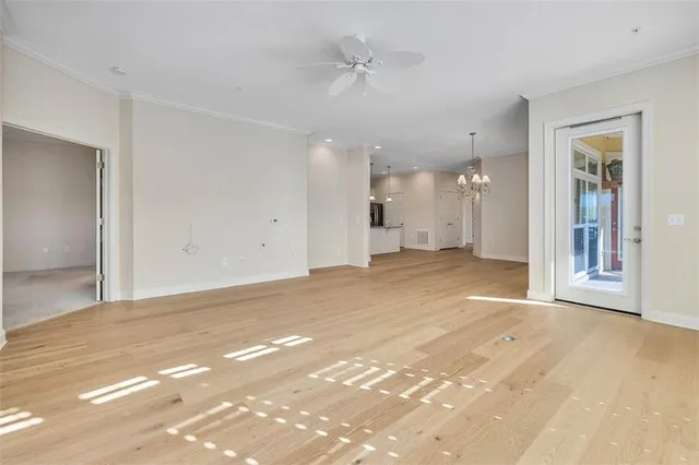 a view of an empty room with a cabinet