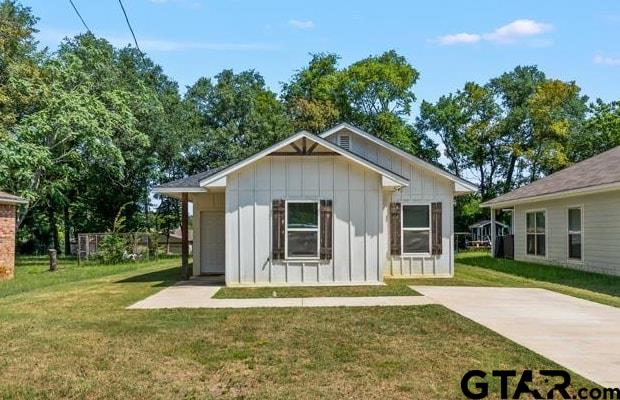 1919 West Jackson Street Tyler, TX 75701 - Photo 1 of 35 front view of a house with a yard