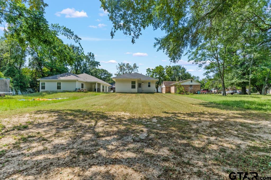 1919 West Jackson Street Tyler, TX 75701 - Photo 34 of 35 a view of a house with a big yard
