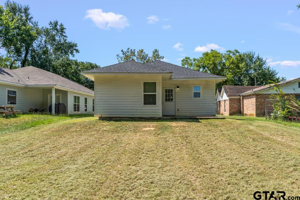 1919 West Jackson Street Tyler, TX 75701 - Photo 35 of 35 front view of a house with a yard
