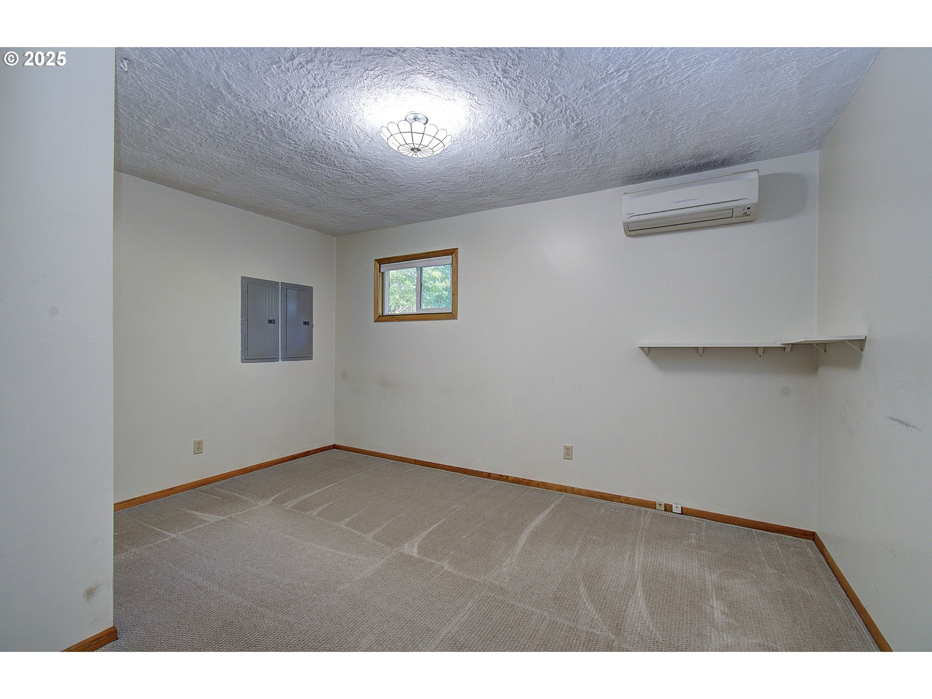 5911 Alki Road Vancouver, WA 98663 - Photo 15 of 29 a view of an empty room with a window