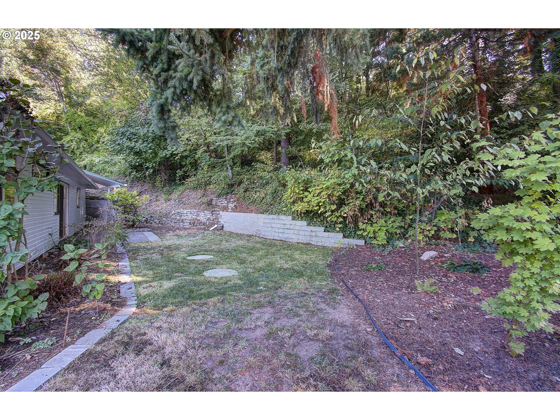 5911 Alki Road Vancouver, WA 98663 - Photo 25 of 29 a view of an outdoor space and a yard